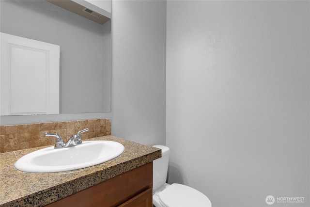 2117 197th Street Ct E, Spanaway, WA 98387 - bathroom with vanity and tasteful backsplash