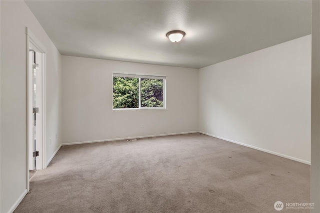 2117 197th Street Ct E, Spanaway, WA 98387 - empty room with carpet floors and baseboards