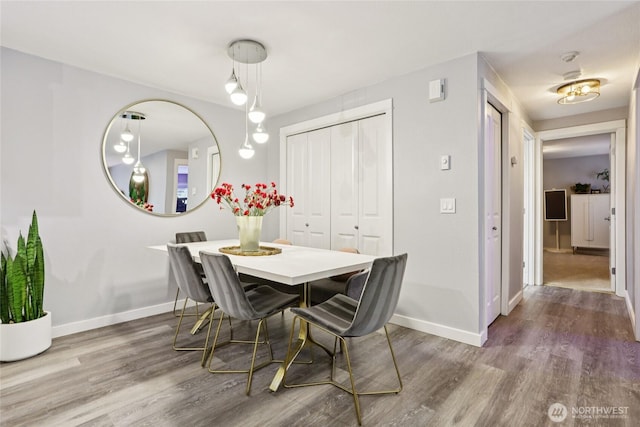 916 3rd Ave Unit A104, Kirkland, WA 98033 - dining room featuring wood finished floors and baseboards