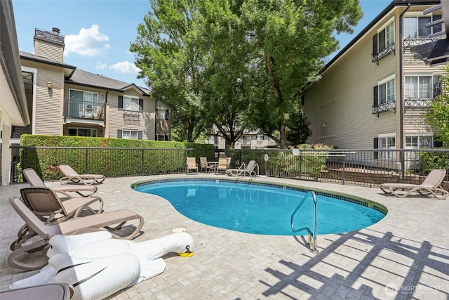 916 3rd Ave Unit A104, Kirkland, WA 98033 - community pool featuring a patio area