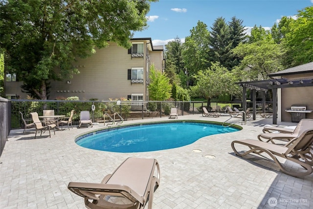916 3rd Ave Unit A104, Kirkland, WA 98033 - community pool featuring a pergola, a patio area, and a grill