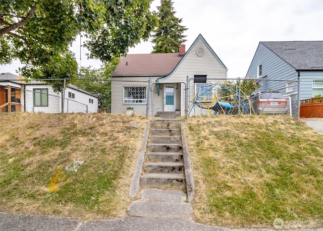 5229 S Thompson Ave, Tacoma, WA 98408 - view of front of home with a chimney