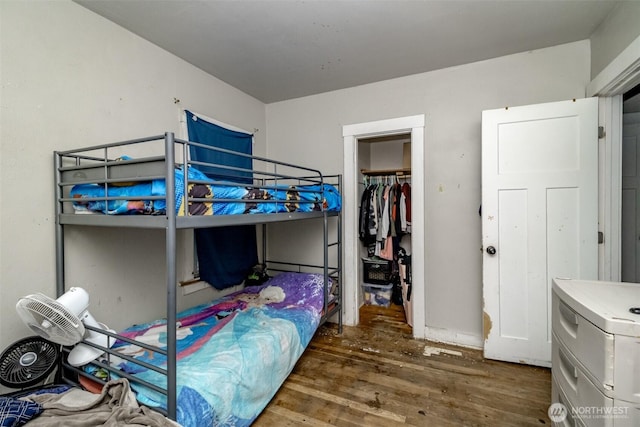 5229 S Thompson Ave, Tacoma, WA 98408 - bedroom with wood finished floors, a closet, and a spacious closet