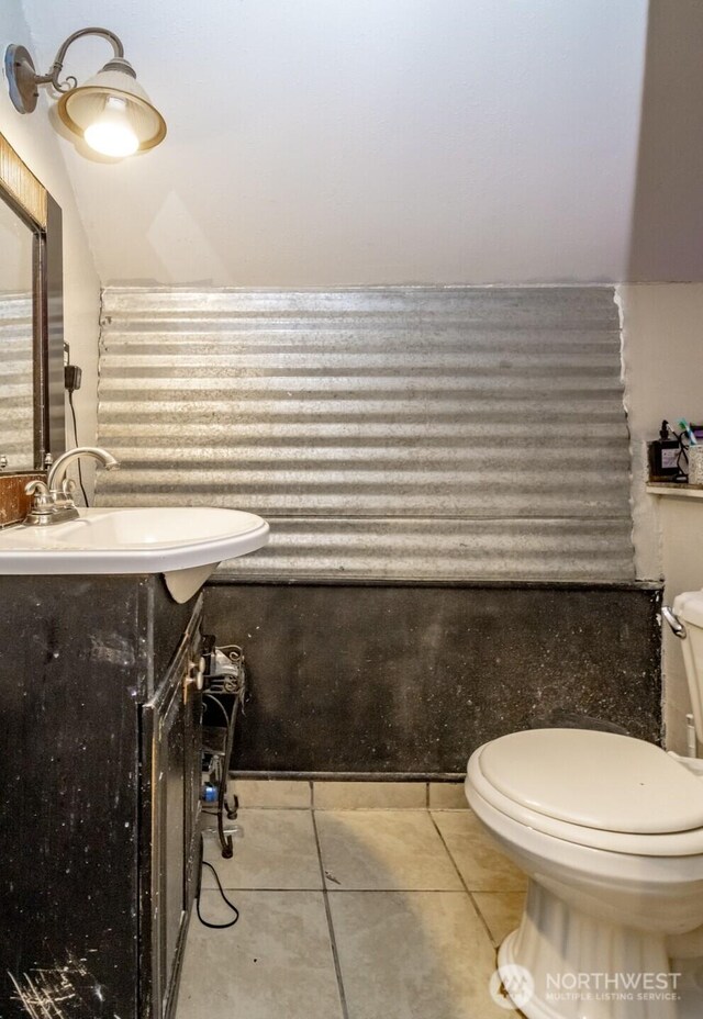 5229 S Thompson Ave, Tacoma, WA 98408 - half bathroom with tile patterned flooring and vanity