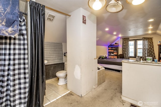 5229 S Thompson Ave, Tacoma, WA 98408 - bathroom featuring toilet and vaulted ceiling