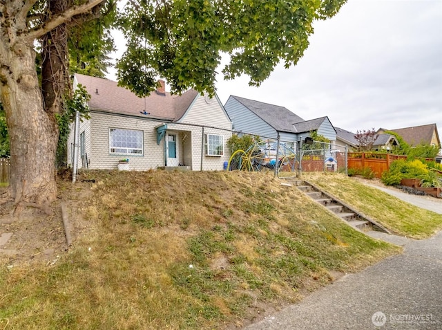 5229 S Thompson Ave, Tacoma, WA 98408 - single story home with a chimney and brick siding