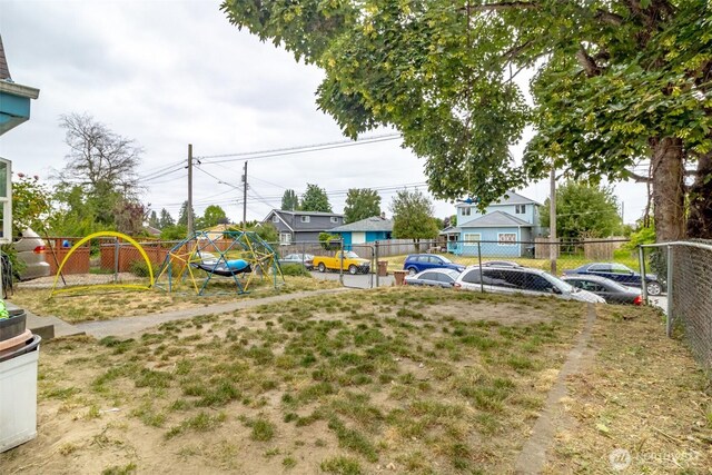 5229 S Thompson Ave, Tacoma, WA 98408 - view of yard featuring a playground