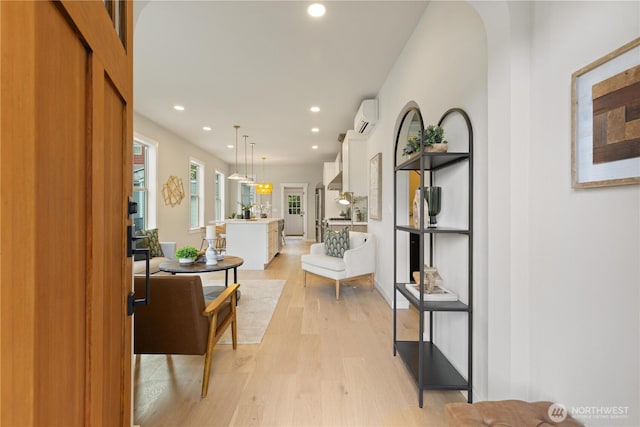 157 26th Ave, Seattle, WA 98122 - corridor with a wall mounted AC, recessed lighting, and light wood-style flooring