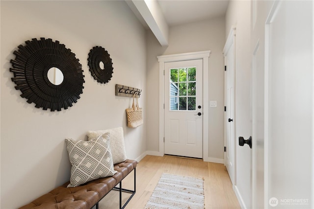 157 26th Ave, Seattle, WA 98122 - doorway to outside with light wood finished floors and baseboards