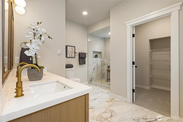 157 26th Ave, Seattle, WA 98122 - full bath featuring a marble finish shower, marble finish floors, a walk in closet, double vanity, and recessed lighting