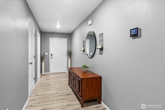 1120 15th Ave, Sultan, WA 98294 - doorway featuring light wood-style flooring and baseboards