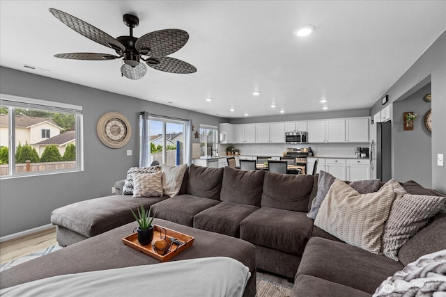 1120 15th Ave, Sultan, WA 98294 - living room with plenty of natural light, light wood-type flooring, a ceiling fan, and recessed lighting
