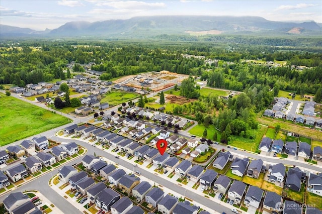 1120 15th Ave, Sultan, WA 98294 - aerial overview of property's location featuring a mountainous background and nearby suburban area