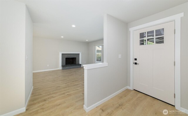 9621 1st Ave SE, Everett, WA 98208 - entryway with light wood-type flooring, a fireplace, and recessed lighting