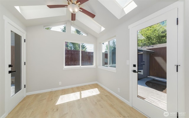 9621 1st Ave SE, Everett, WA 98208 - unfurnished sunroom featuring a skylight and vaulted ceiling