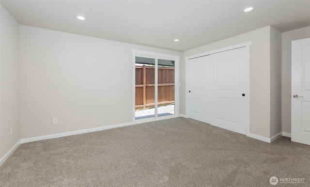9621 1st Ave SE, Everett, WA 98208 - unfurnished bedroom featuring carpet floors, recessed lighting, and a closet