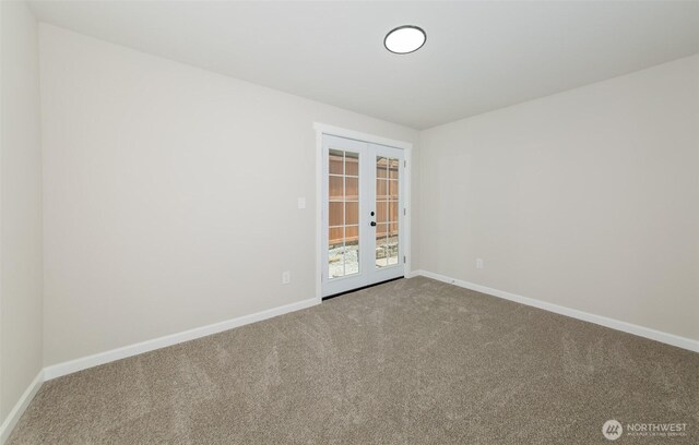 9621 1st Ave SE, Everett, WA 98208 - carpeted empty room featuring french doors and baseboards