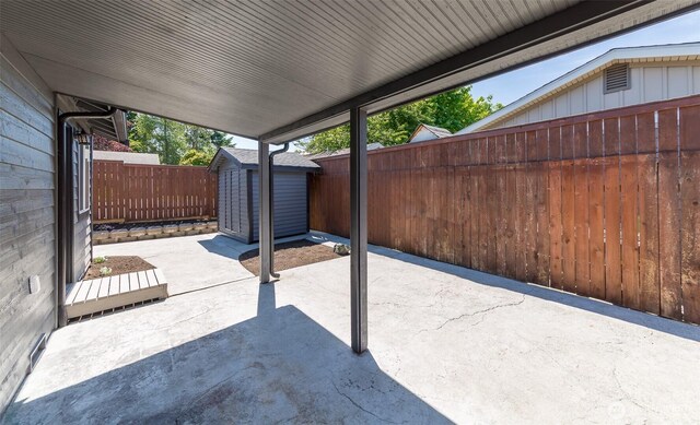 9621 1st Ave SE, Everett, WA 98208 - fenced backyard with a patio area and a storage shed