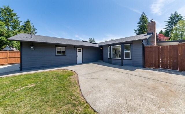 9621 1st Ave SE, Everett, WA 98208 - ranch-style house with a patio area, a shingled roof, and a chimney