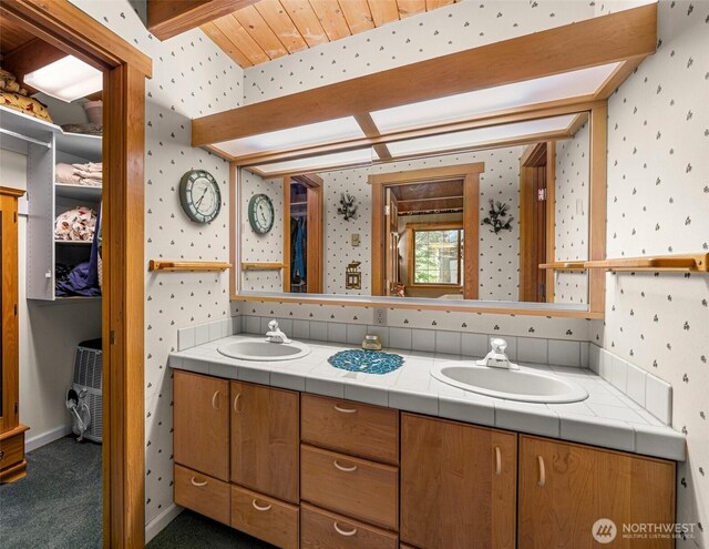 2290 Riffle Dr, Leavenworth, WA 98826 - full bathroom with double vanity and wallpapered walls