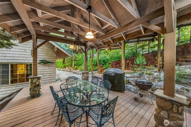 2290 Riffle Dr, Leavenworth, WA 98826 - wooden deck with a grill and outdoor dining area