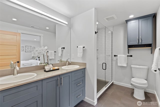8315 24th Ave NW, Seattle, WA 98117 - ensuite bathroom with double vanity, tile patterned flooring, a shower stall, and recessed lighting