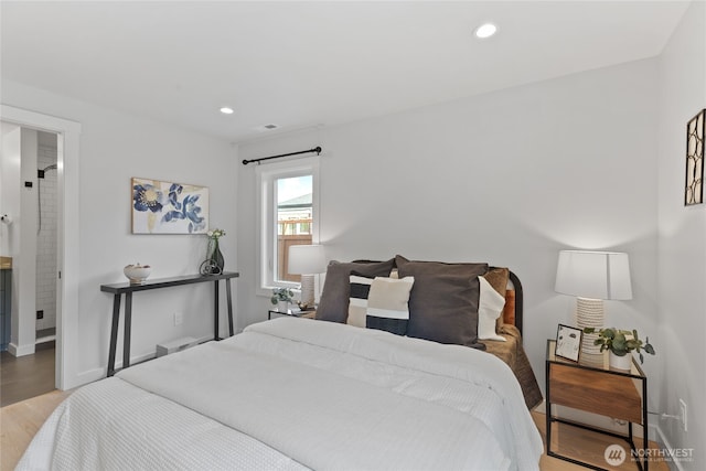 8315 24th Ave NW, Seattle, WA 98117 - bedroom with light wood-type flooring and recessed lighting