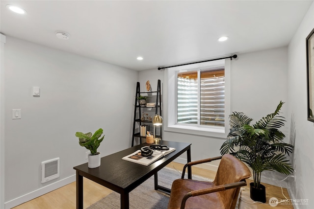 8315 24th Ave NW, Seattle, WA 98117 - home office featuring light wood-type flooring and recessed lighting