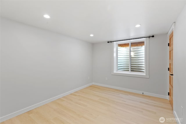 8315 24th Ave NW, Seattle, WA 98117 - unfurnished room with light wood finished floors and recessed lighting