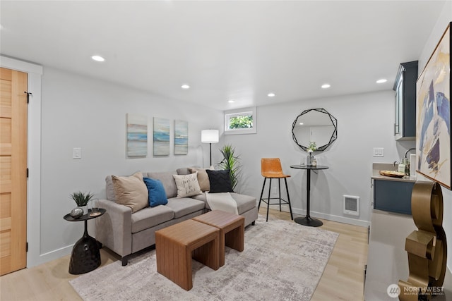 8315 24th Ave NW, Seattle, WA 98117 - living area featuring recessed lighting and light wood-style flooring