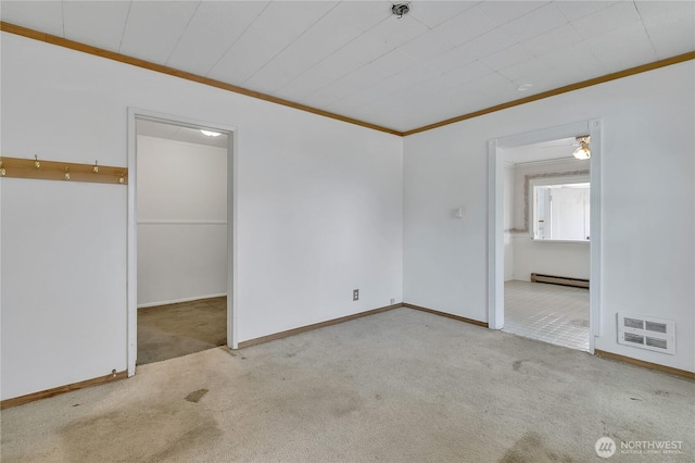 2209 S Talbot Rd, Renton, WA 98055 - spare room featuring ornamental molding, carpet floors, a baseboard radiator, and fire sprinkler in ceiling