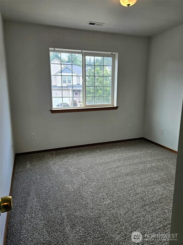 741 G St SW, Tumwater, WA 98512 - carpeted empty room featuring baseboards