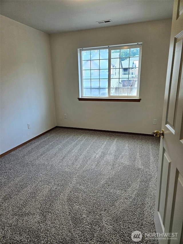 741 G St SW, Tumwater, WA 98512 - carpeted empty room with baseboards
