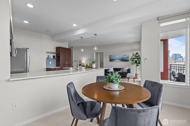 232 Belmont Ave E Unit 503, Seattle, WA 98102 - dining room with light colored carpet and recessed lighting