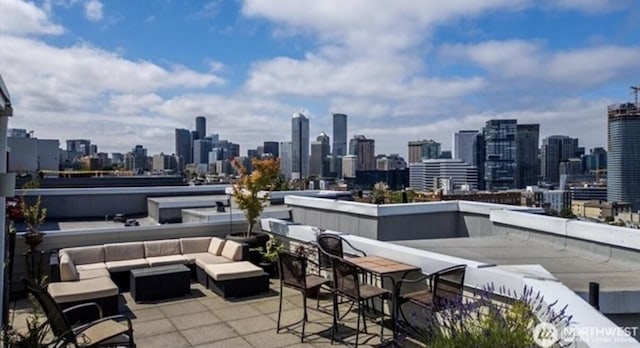 232 Belmont Ave E Unit 503, Seattle, WA 98102 - view of patio / terrace featuring outdoor lounge area and a view of skyline