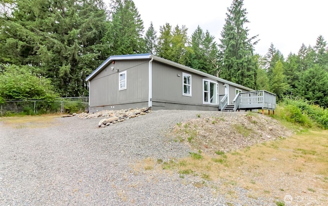 3010 248th Street Ct E, Spanaway, WA 98387 - manufactured / mobile home featuring a wooden deck