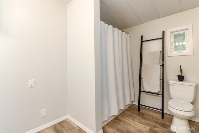 3010 248th Street Ct E, Spanaway, WA 98387 - bathroom featuring wood finished floors and a shower with curtain