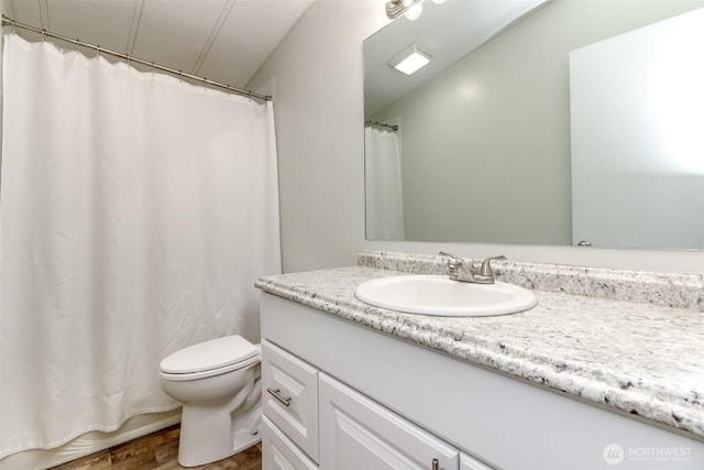 3010 248th Street Ct E, Spanaway, WA 98387 - full bathroom featuring vanity, wood finished floors, and a shower with shower curtain