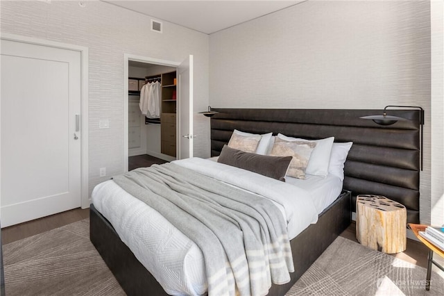 2510 6th Ave Unit 1704, Seattle, WA 98121 - bedroom with wood finished floors and a spacious closet