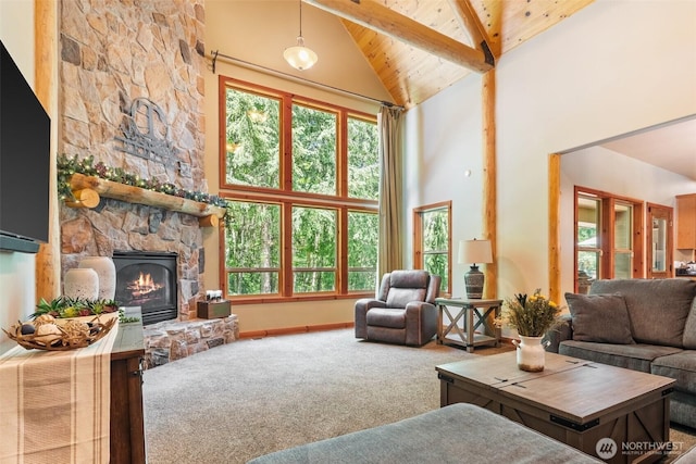 143 Scenic Ln, Mossyrock, WA 98564 - carpeted living area featuring high vaulted ceiling, a wooden ceiling with exposed beams, plenty of natural light, and a fireplace