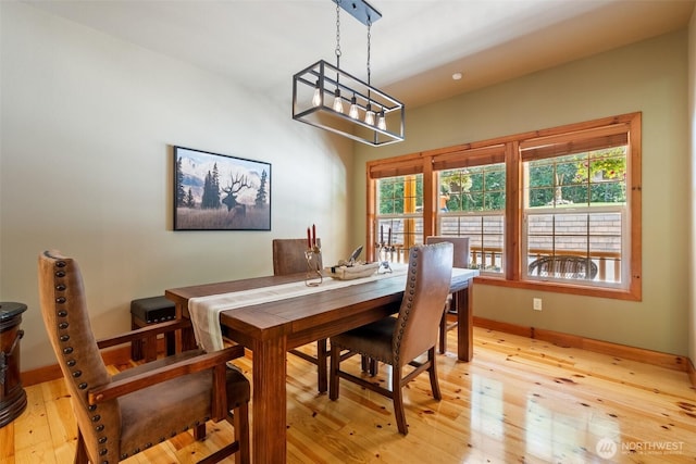 143 Scenic Ln, Mossyrock, WA 98564 - dining room with light wood finished floors and a chandelier