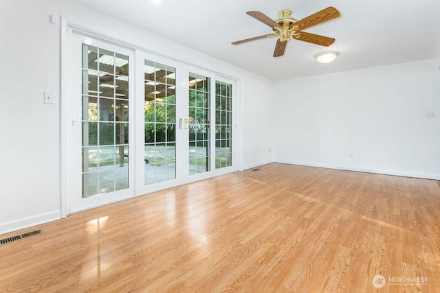 731 Maplewood Ave, Kent, WA 98030 - unfurnished room featuring wood finished floors and ceiling fan