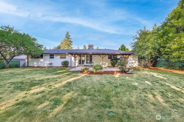 731 Maplewood Ave, Kent, WA 98030 - rear view of property featuring a patio area and a chimney
