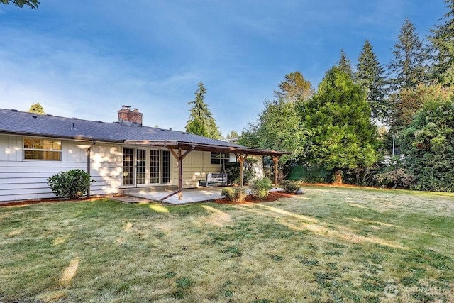 731 Maplewood Ave, Kent, WA 98030 - rear view of property featuring a patio area, a chimney, and a yard