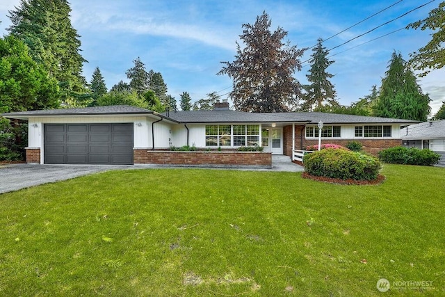 731 Maplewood Ave, Kent, WA 98030 - single story home with brick siding, a garage, driveway, and a front lawn