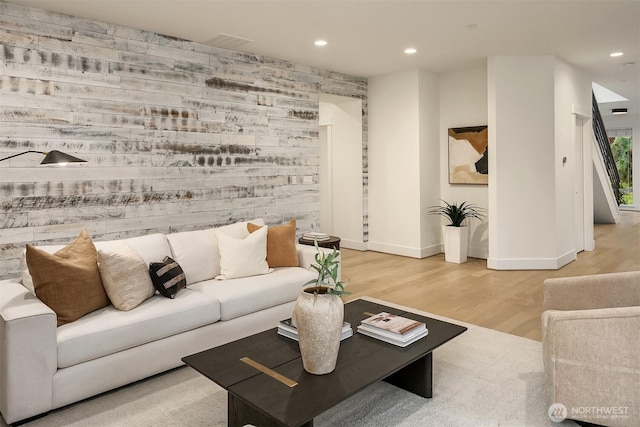 10637 128th Ave NE, Kirkland, WA 98033 - living area with an accent wall, recessed lighting, and wood finished floors