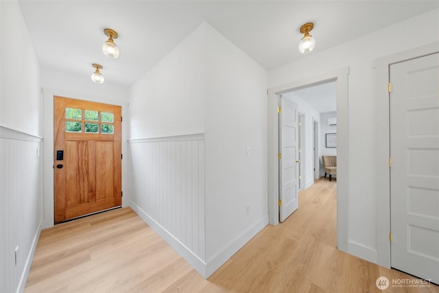 4658 N Defiance St, Tacoma, WA 98407 - entrance foyer with light wood-style flooring and wainscoting