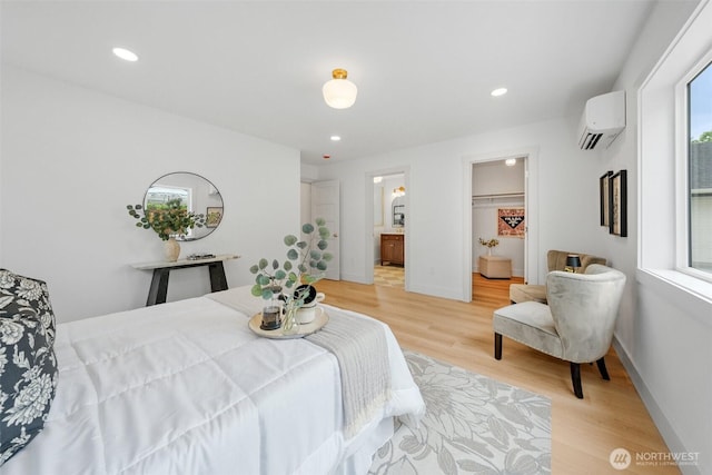 4658 N Defiance St, Tacoma, WA 98407 - bedroom with a wall mounted AC, light wood-type flooring, multiple windows, and recessed lighting
