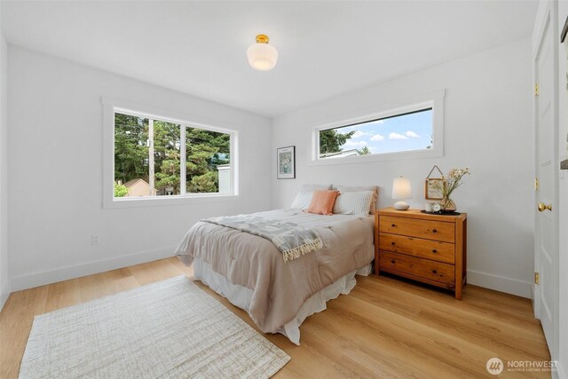 4658 N Defiance St, Tacoma, WA 98407 - bedroom featuring light wood-type flooring and baseboards
