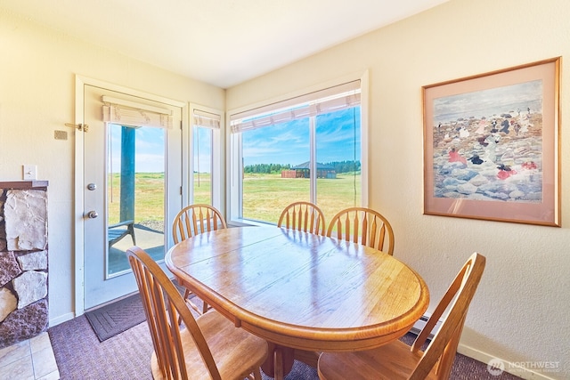 210 26th St NW Unit 201/2, Long Beach, WA 98631 - dining area with baseboards